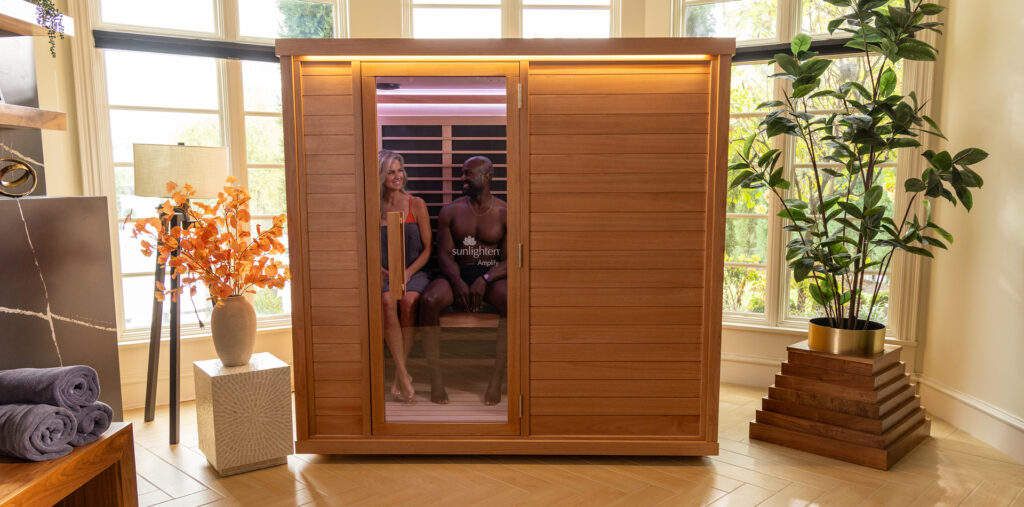 man and woman chatting in an amplify infrared sauna